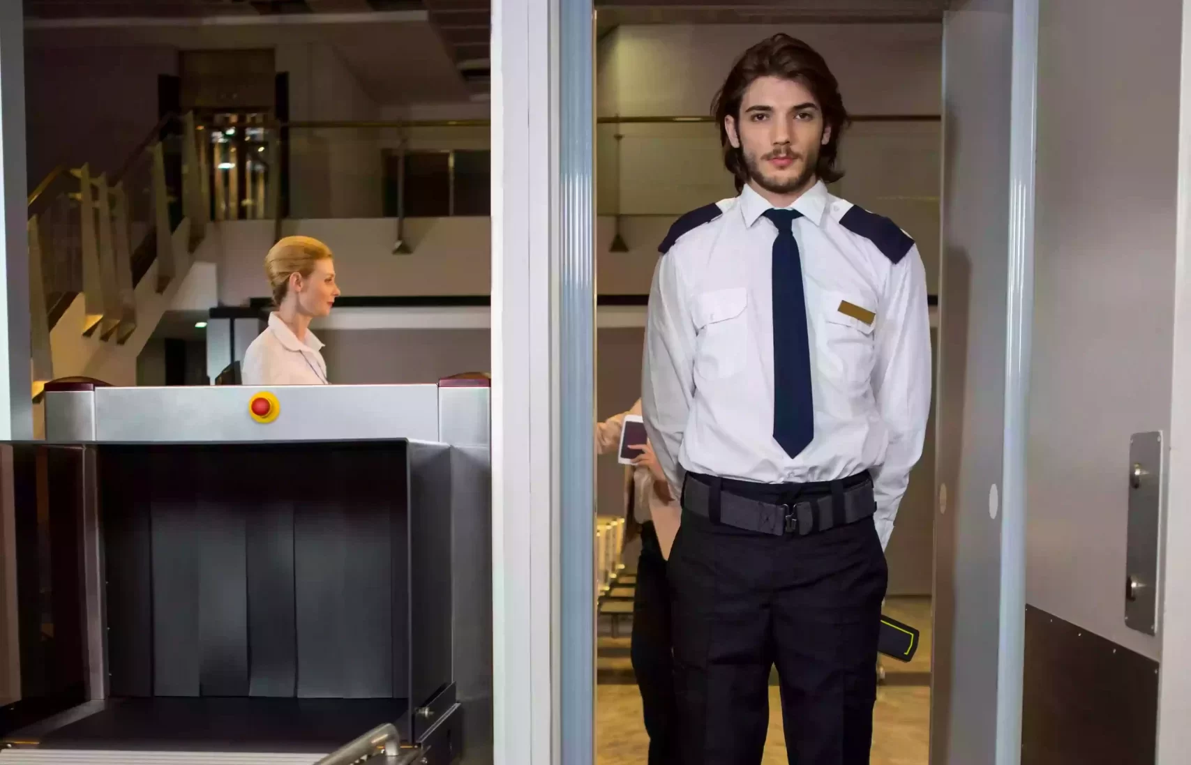 Security guard patrolling a hotel lobby